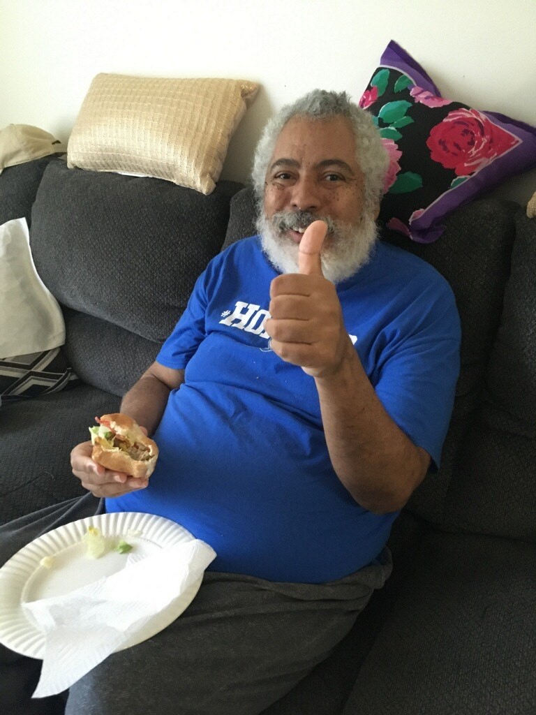 A man we support gives the thumbs up on a healthy sub he helped make
